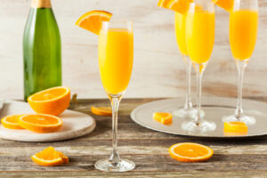 mimosa cocktail ricetta con ingredienti e preparazione del drink a base di succo d arancia e prosecco